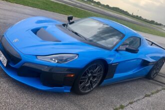 blue sportscar on a track