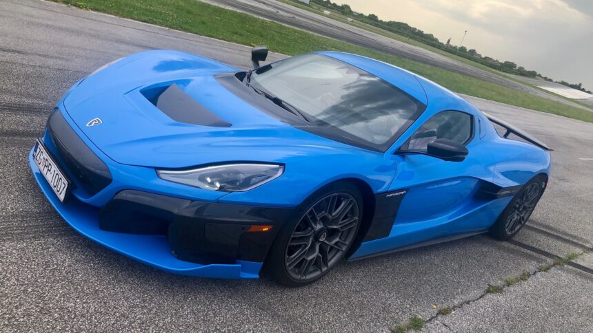 blue sportscar on a track