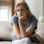 woman sitting on sofa Bitter Person