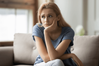 woman sitting on sofa Bitter Person