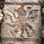 an ancient wall painting in an archaeological site in northern coastal Peru depicting a supernatural being