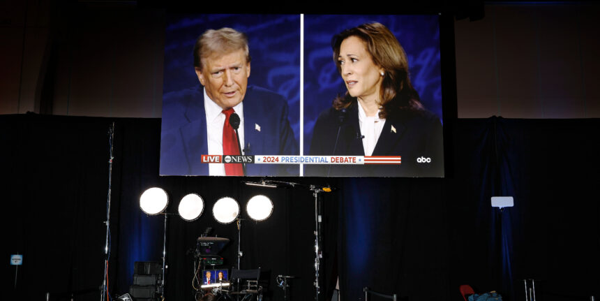 A large split screen shows Donald Trump on the left and Kamala Harris on the right during the 2024 presidential debate