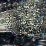 dollar bill exploding into pixels