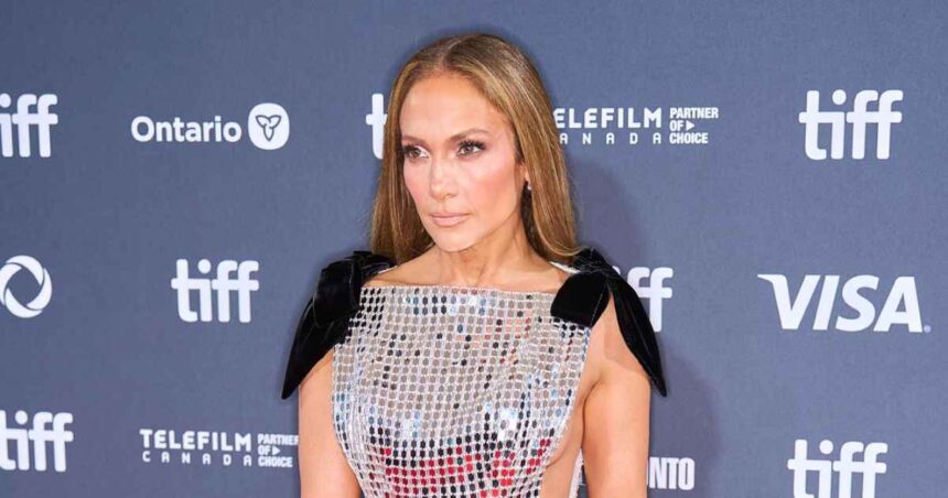 Jennifer Lopez Stuns in Side-Baring Gown on TIFF Red Carpet