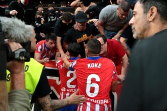 Madrid derby chaos: Game suspended after Atletico Madrid fans throw objects onto pitch after Real Madrid goal