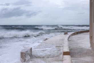 Waves from the Gulf of Mexico push up against the shore as Hurricane Helene churns offshore near St. Pete Beach, Florida, on September 26, 2024.