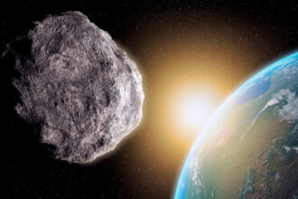 An asteroid floats in space in the foreground, with the Earth in the background.