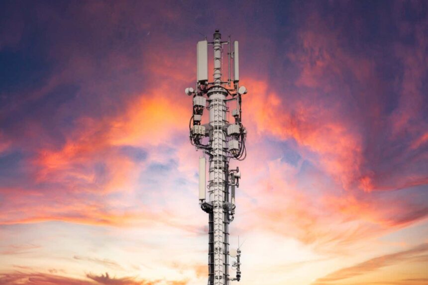 Mobile phone antenna station at sunset