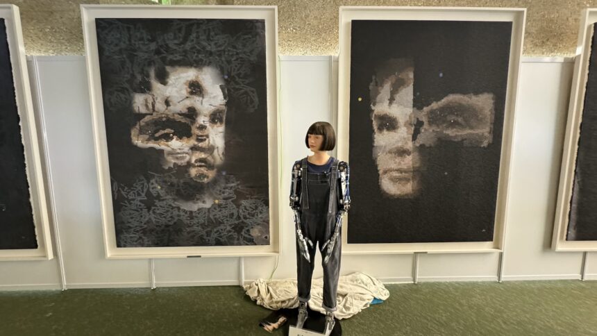 A humanoid robot's painting called 'AI God' may sell for over $120,000