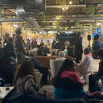 Supporters of Kamala Harris gathered for a watch party Tuesday evening at Cred Cafe, a Black-owned coffee shop that doubles as a speakeasy in Detroit, to view a live feed of her interview with radio host Charlamagne tha God.