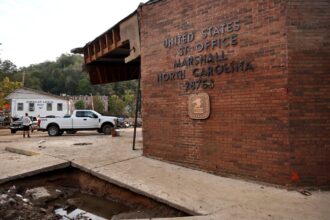 A view of a United States Post Office, damaged by flooding.