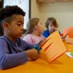 Student cutting paper showing it's time to let go of learning styles