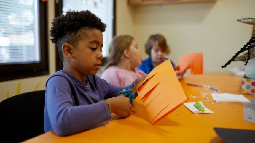 Student cutting paper showing it's time to let go of learning styles