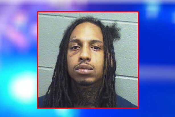 Man on house arrest for gun case had machine gun, pistol, drugs, and ,180 cash in his living room, prosecutors say