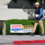 A man makes his way to vote at the Orange County Registrar in Santa Ana, California, on March 5.