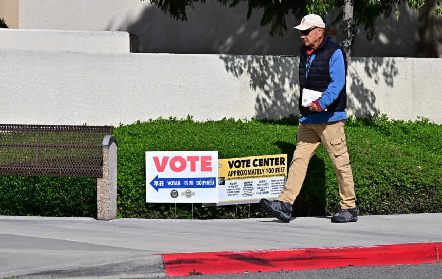 A man makes his way to vote at the Orange County Registrar in Santa Ana, California, on March 5.