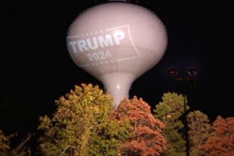 Town Fines Resident Who Projected Trump Sign Onto Water Tower