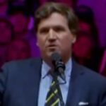 Tucker Carlson at Trump rally.