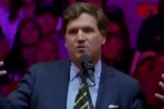 Tucker Carlson at Trump rally.