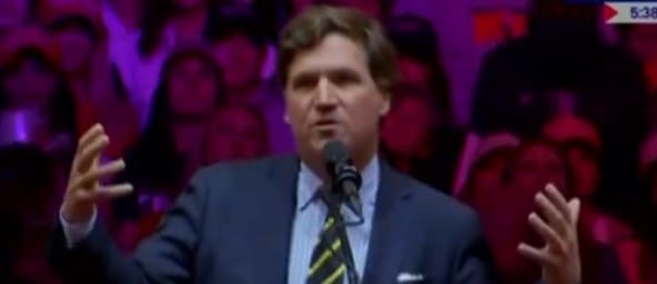 Tucker Carlson at Trump rally.