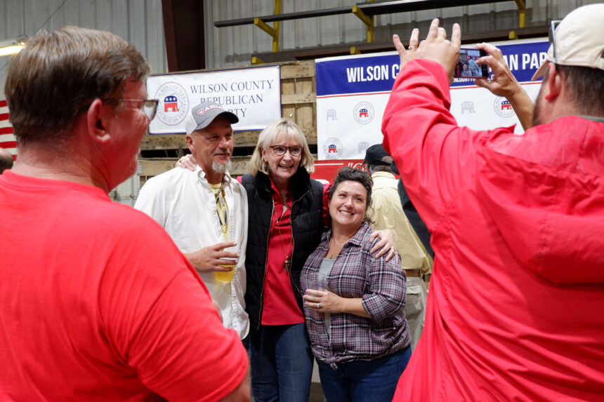 GOP congressional candidate Laurie Buckhout (center) poses with supporters at the Wilson County GOP Dinner.