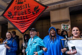 People lined up at a climate protest in Manhattan, New York.