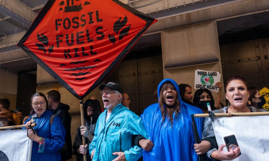 People lined up at a climate protest in Manhattan, New York.