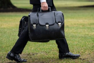 A military aide carries the "nuclear football."