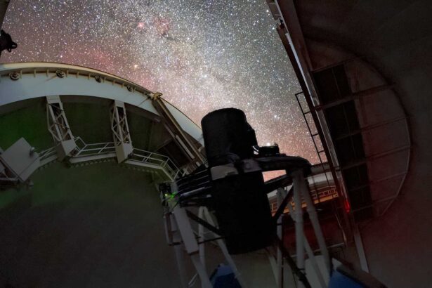 A telescope instrument is pointed at a starry sky.