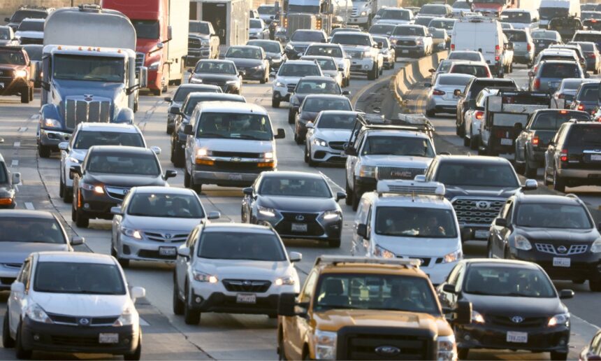 Heavy afternoon traffic moves along the I-5 in Los Angeles, California.