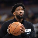 Joel Embiid shoves columnist in 76ers locker room, per sources; NBA to investigate the incident