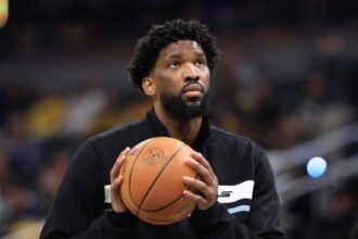 Joel Embiid shoves columnist in 76ers locker room, per sources; NBA to investigate the incident