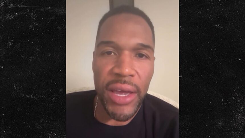 Michael Strahan Addresses National Anthem Backlash, I Wasn't Making a Statement!