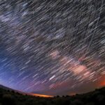 A timelapse image of satellite tracks in the sky.