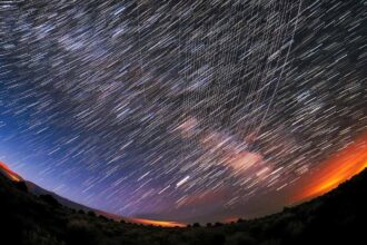 A timelapse image of satellite tracks in the sky.