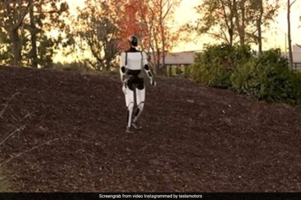 Elon Musk’s Tesla Robot “Stumbles Like A Human” While Learning To Walk On Slopes