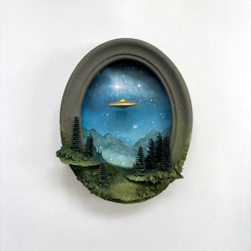 within a miniature ovoid frame, a detailed diorama depicts a landscape with a hovering UFO