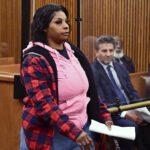 Fiona Allen walks toward the bench for her arraignment in Cuyahoga County Common Pleas Court on Dec. 3, 2024, in Cleveland.