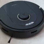 Roborock Q5 Pro robot vacuum on a tiled floor