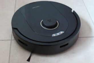 Roborock Q5 Pro robot vacuum on a tiled floor