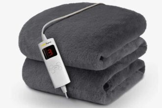 Cosi Home faux fur throw in grey, with controls visible