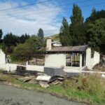 Empty house goes up in flames