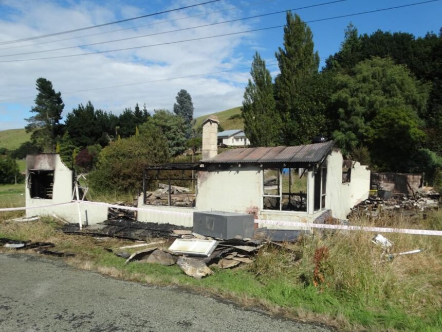 Empty house goes up in flames