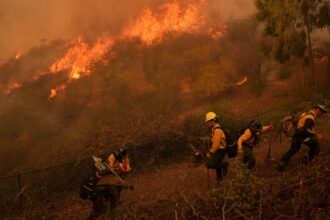 Firefighters Race To Contain Los Angeles Wildfires With Menacing Winds Forecast To Return