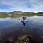 The field team sampling a lake near Kangerlussuaq, Greenland, that browned after the extreme events.