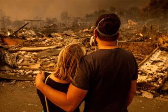 couple observes LA fire damage