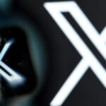 Zoomed-in image of the X app logo, with a larger, blurrier X to the right