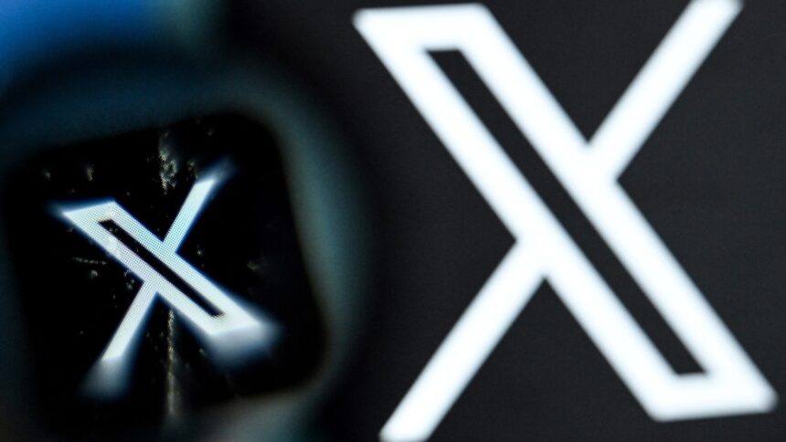 Zoomed-in image of the X app logo, with a larger, blurrier X to the right