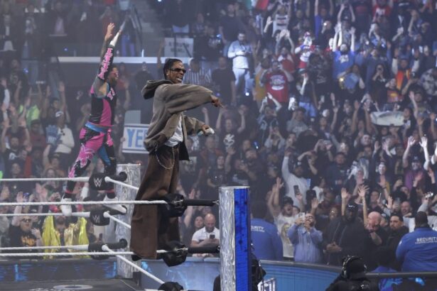 Travis Scott Hypes the Crowd at WWE’s ‘Monday Night Raw’