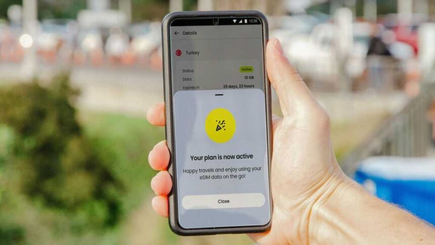 An eSIM plan active message on a smartphone